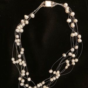 Freshwater pearl floating necklace.